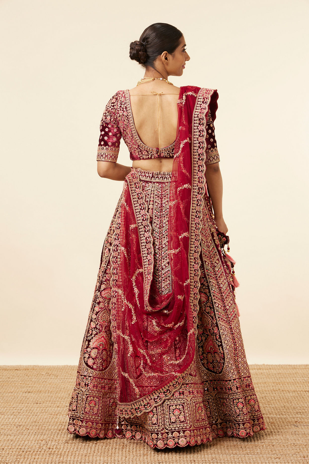 alt message - Mohey Women Maroon Embellished Bridal Lehenga image number 3